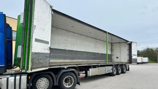 Leasing Semi-trailer Ekeri SIDE OPENING + LAST AXLE STEERING + BOX HEATING 2013