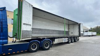 Leasing Semi-trailer Ekeri SIDE OPENING + LAST AXLE STEERING + BOX HEATING 2013