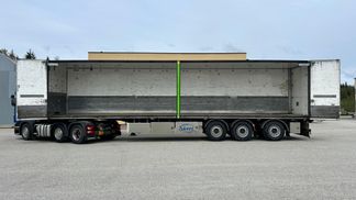Leasing Semi-trailer Ekeri SIDE OPENING + LAST AXLE STEERING + BOX HEATING 2013